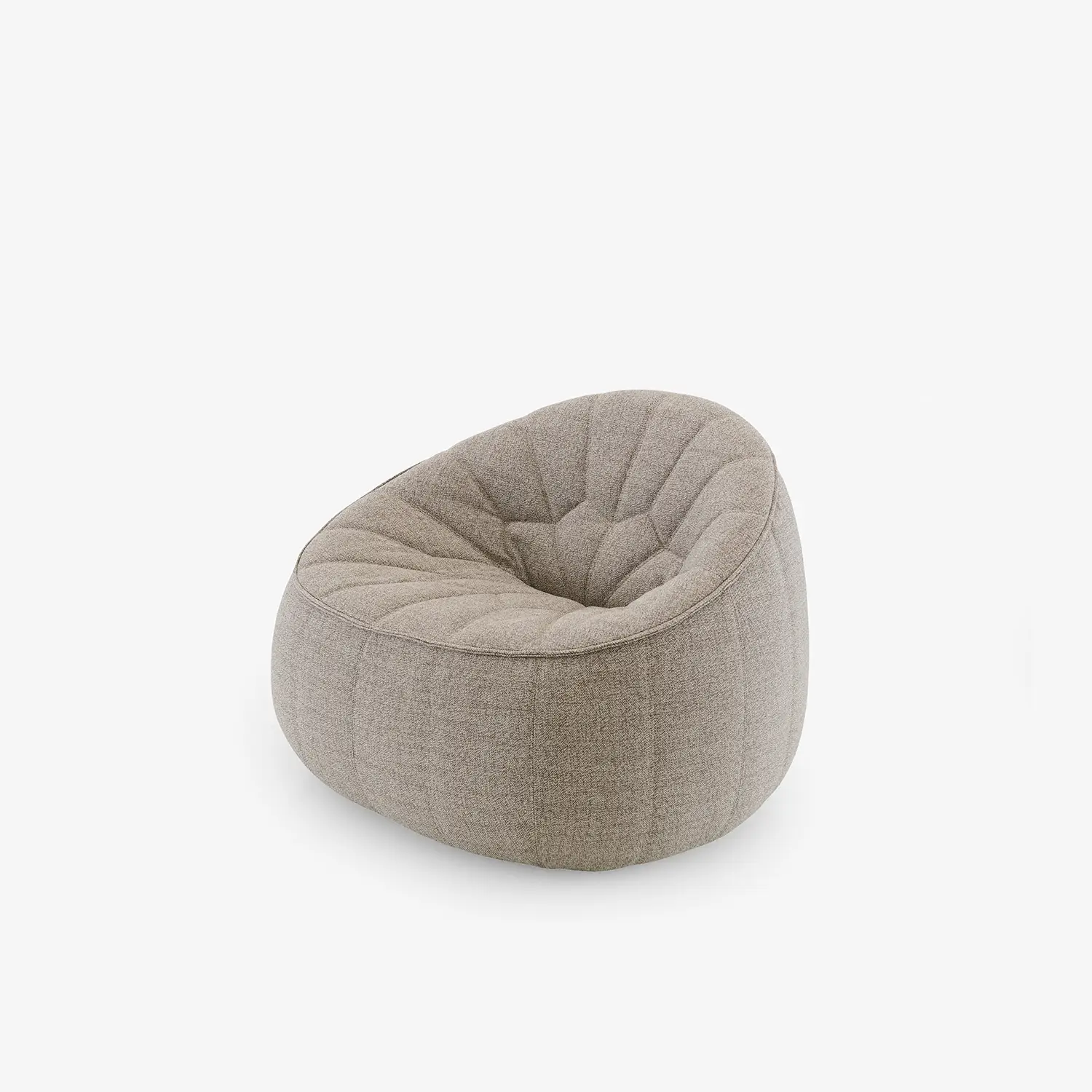 Modern, rounded beige fabric lounge chair with tufted cushioning and a low profile.