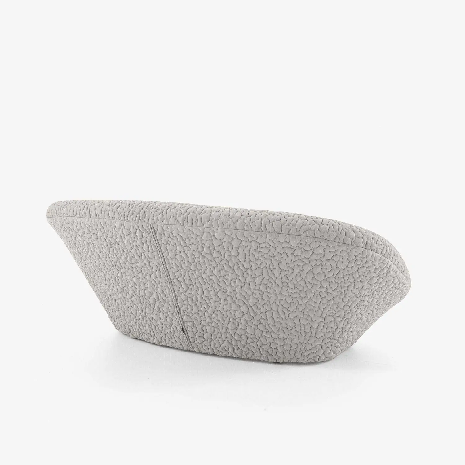 Light gray textured modern sofa with a curved backrest, viewed from behind on a white background.