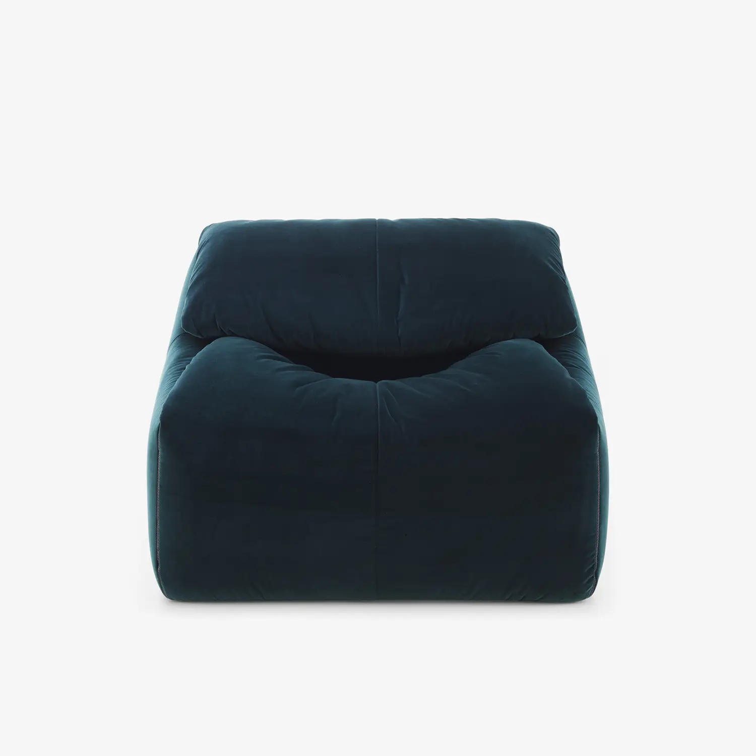Plumy armchair with deep, plush cushioning and a low, rounded backrest in dark teal fabric.