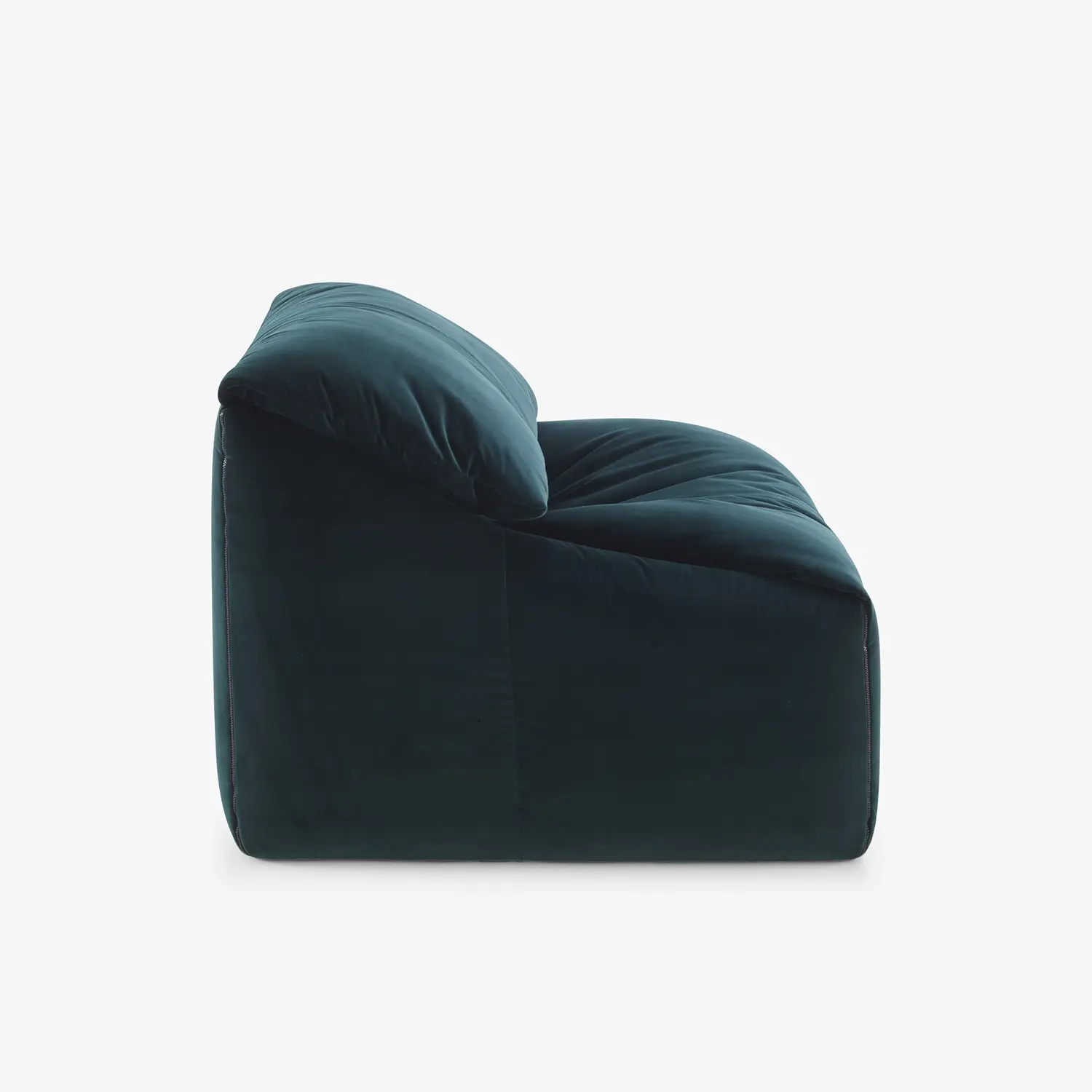 Side view of a dark green plush armchair with a soft, cushioned backrest and seat.