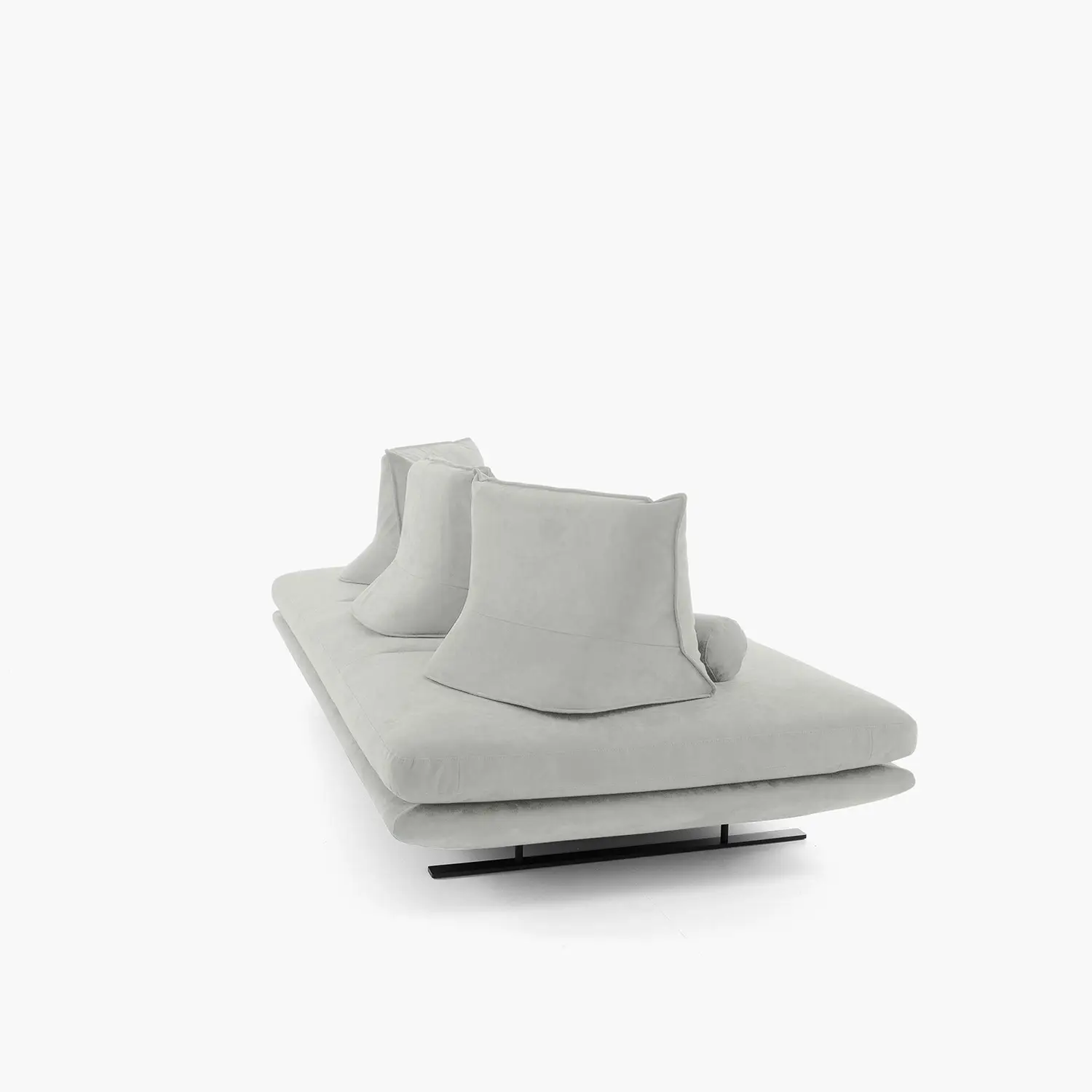 Modern light gray settee with two back cushions and a cylindrical bolster pillow on a black metal base.