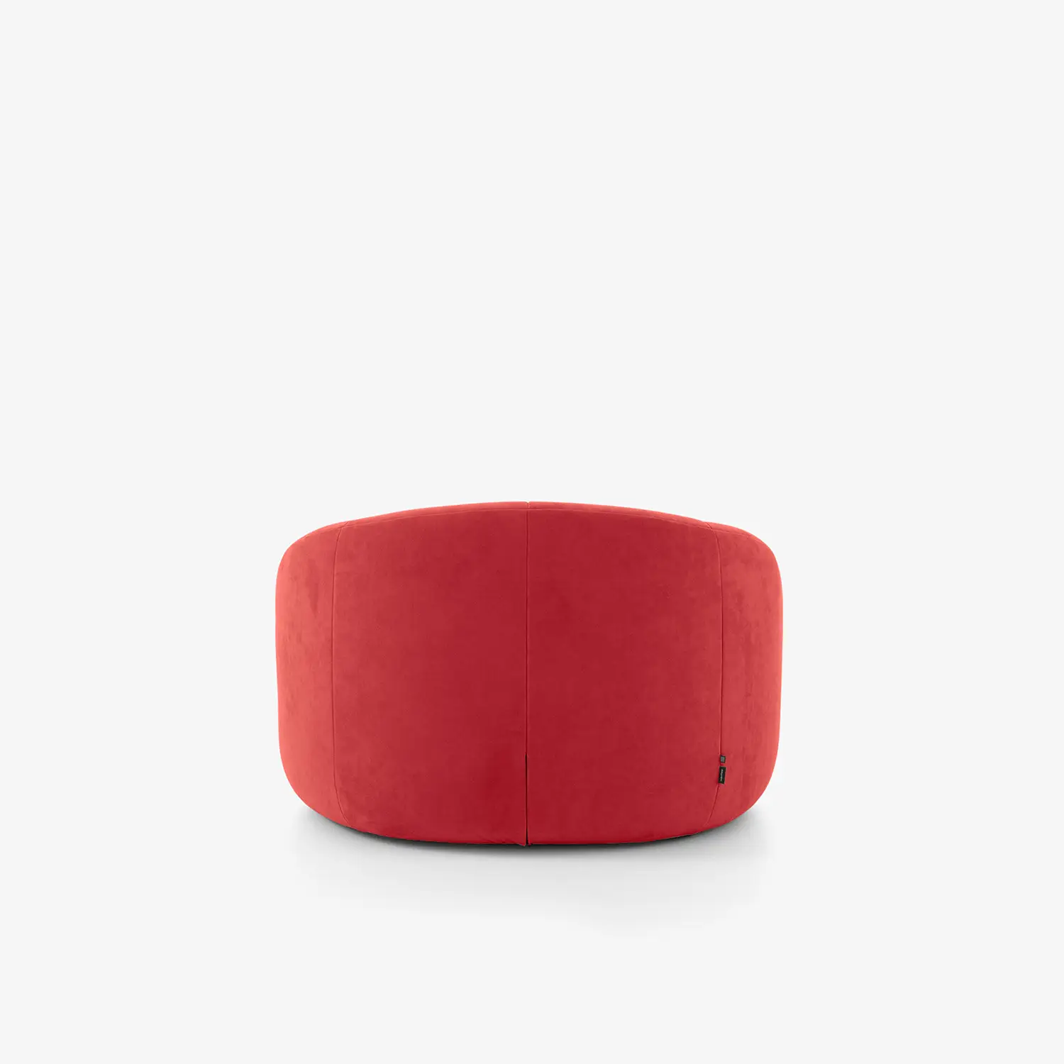 Rear view of a modern, plush red swivel armchair with rounded edges on a white background.