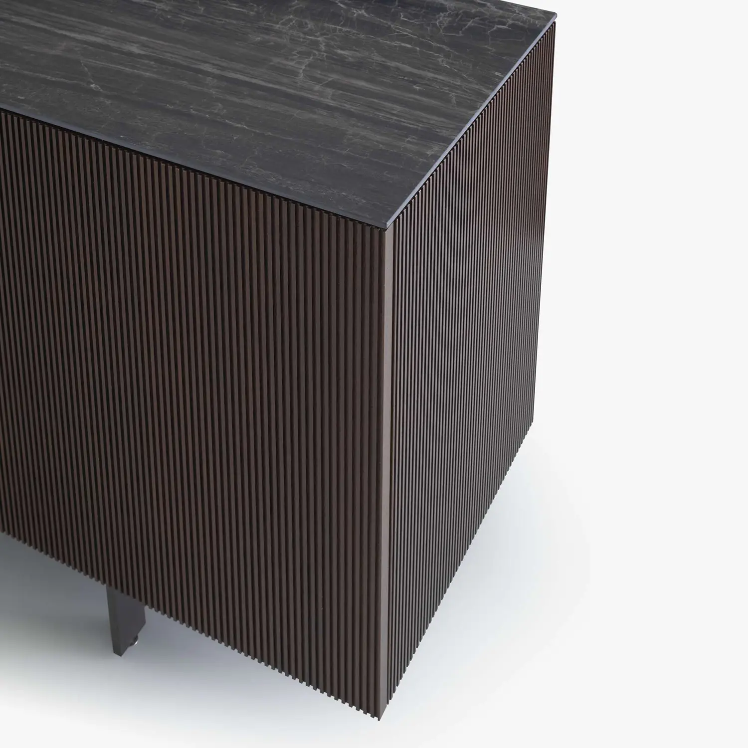 Dark brown sideboard with vertical slats on the sides and a black marble top.